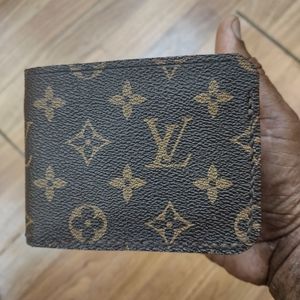Repurposed upcycled Louis Vuitton 7 pocket wallet .